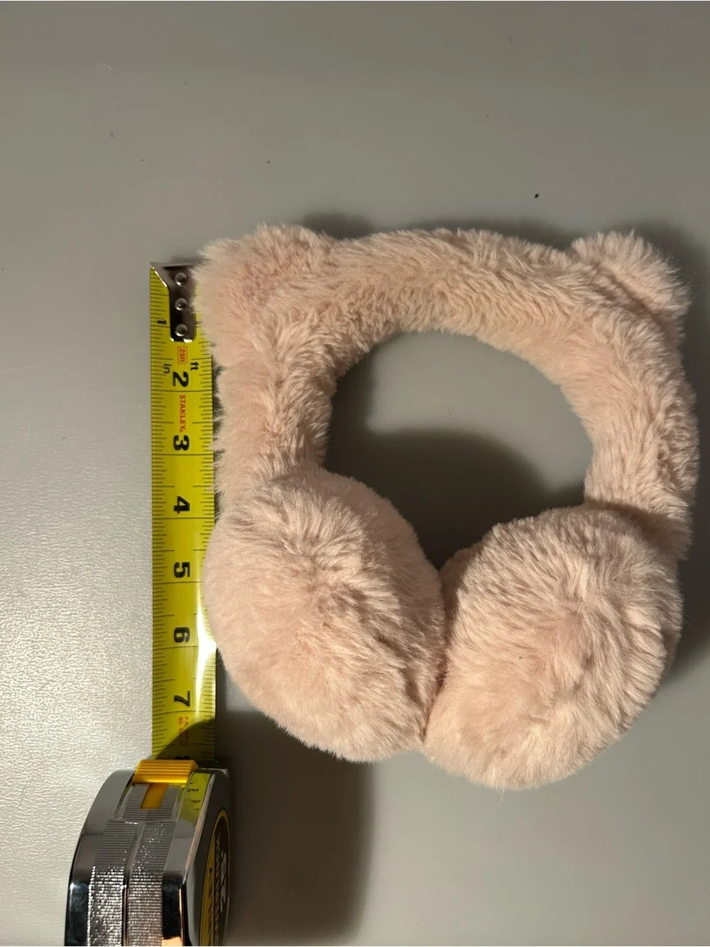 Kids pink fuzzy cat ear muffs
